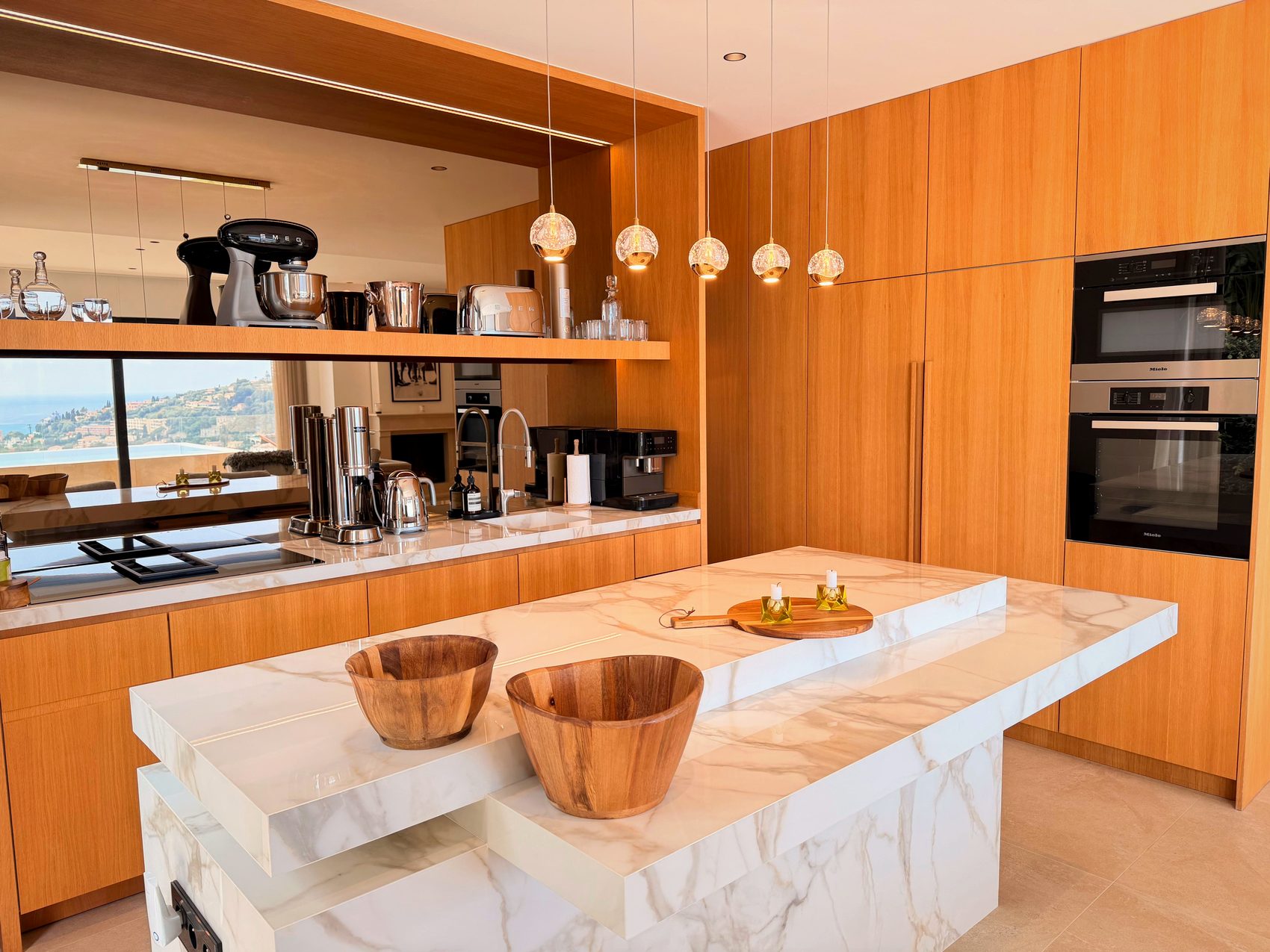 Kitchen with island, open through to the living room