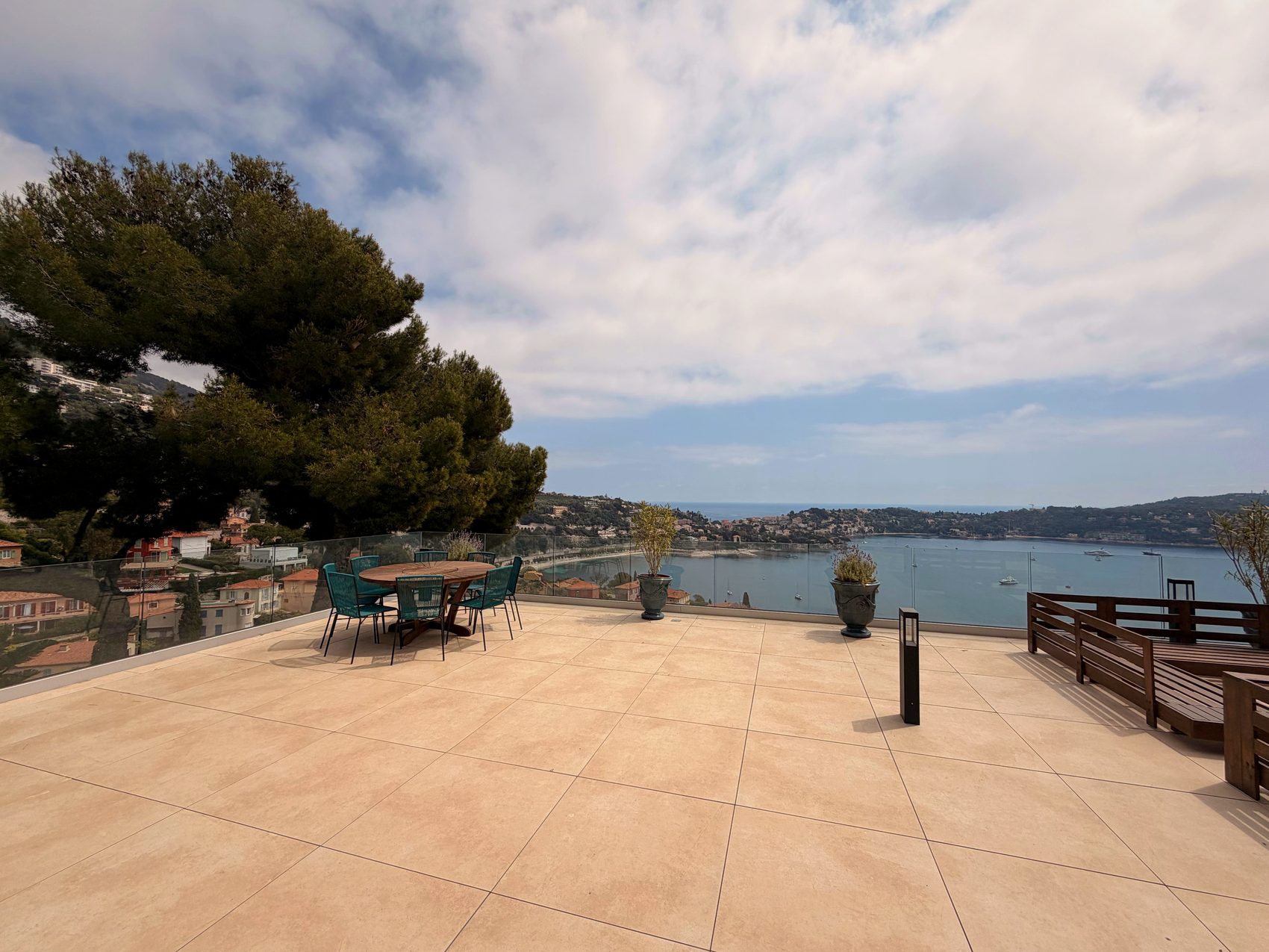 Dining set on the rooftop terrace with panoramic views over the bay