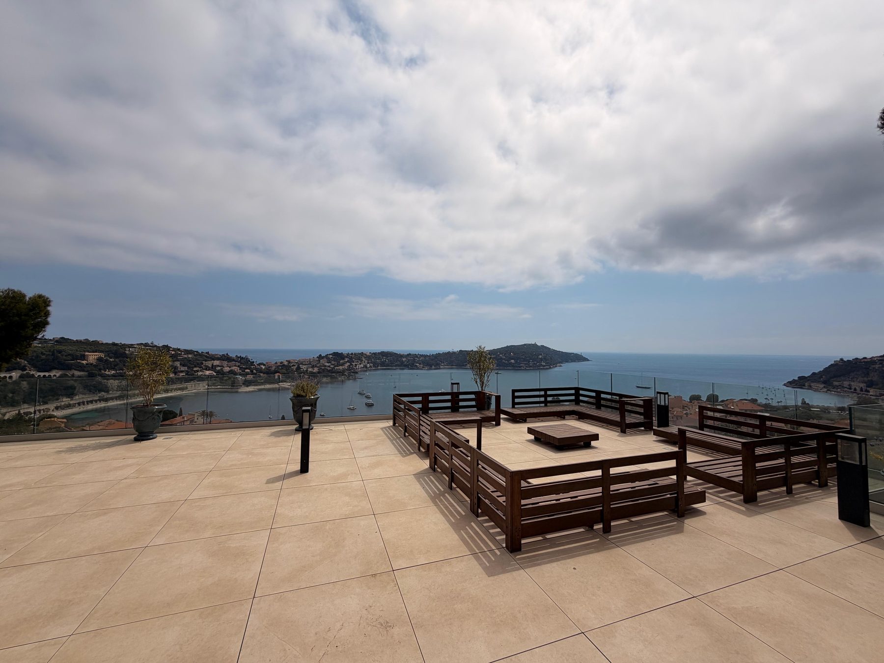 Rooftop terrace with lounge seating and panoramic views to Saint-Jean-Cap-Ferrat